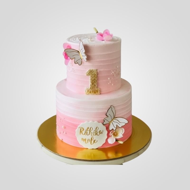 pink two-tier 1st birthday cake pink two-tier 1st birthday cake